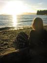 Ashe enjoying the sunset at a beach in Stanley Park.